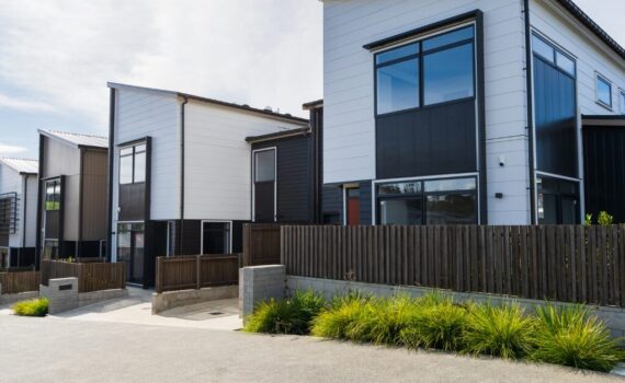Modern row of multifamily rental properties, representing real estate assets that can benefit from cost segregation tax strategies.