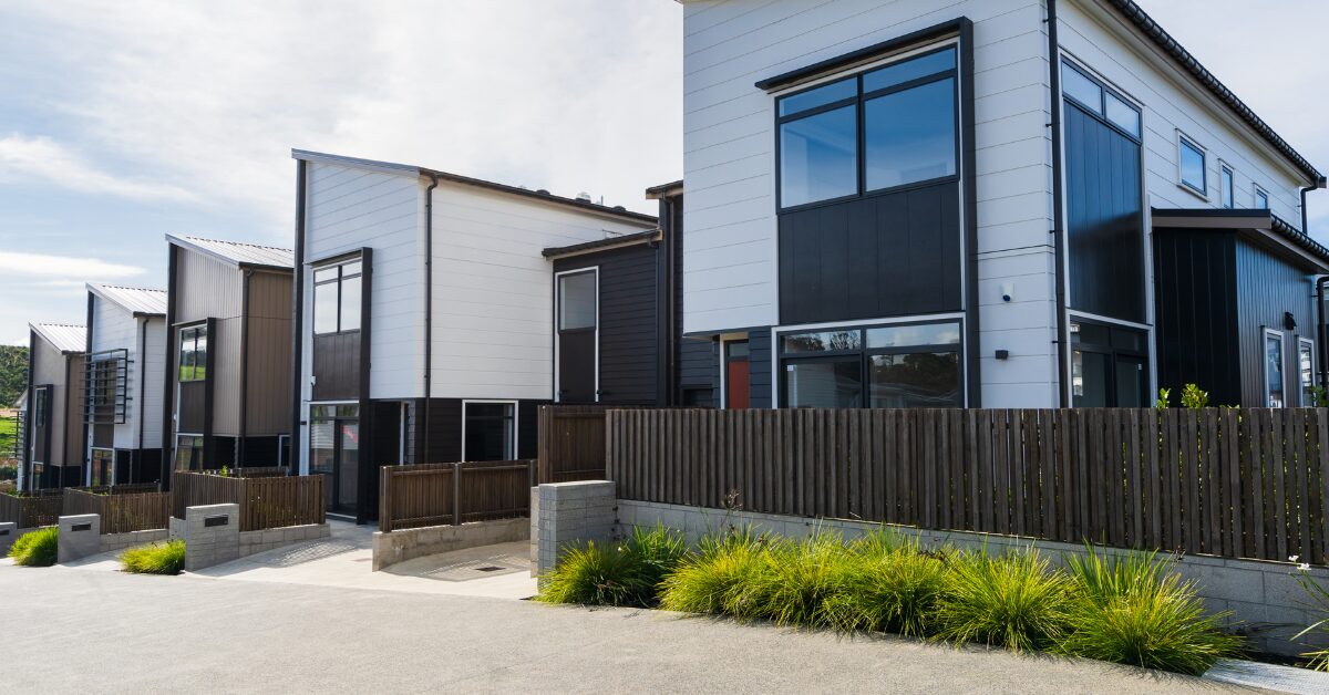 Modern row of multifamily rental properties, representing real estate assets that can benefit from cost segregation tax strategies.