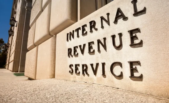 IRS building exterior with Internal Revenue Service sign used for a guide on how IRS audits work for real estate investors.