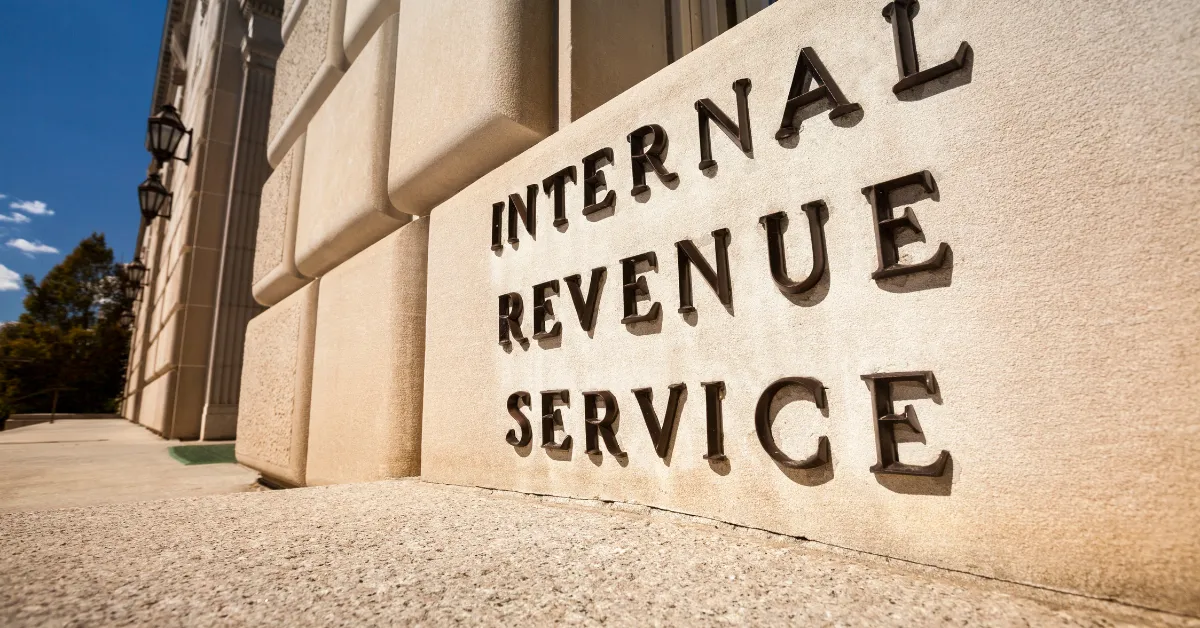 IRS building exterior with Internal Revenue Service sign used for a guide on how IRS audits work for real estate investors.